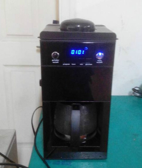 Grinding coffee beans type machine